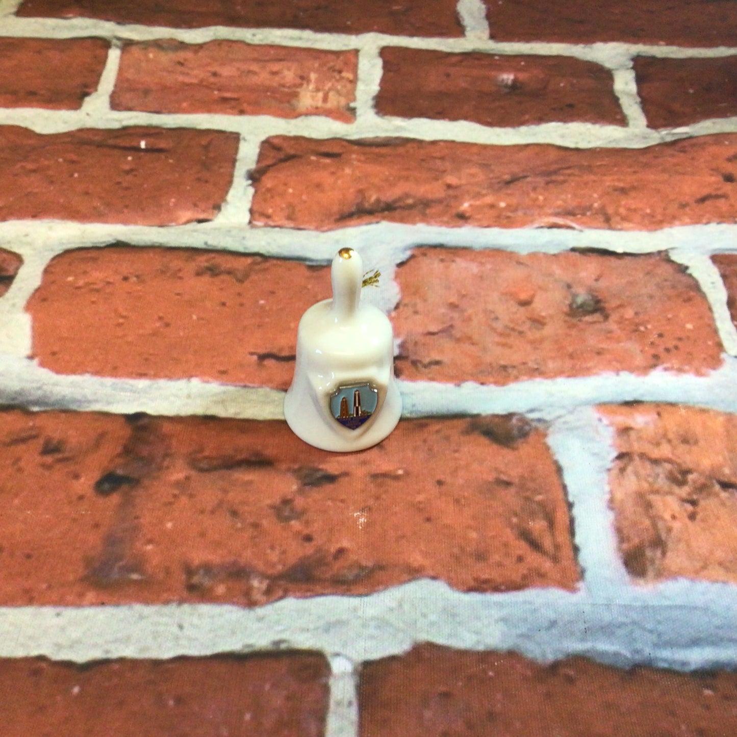 Porcelain Bell with Shield